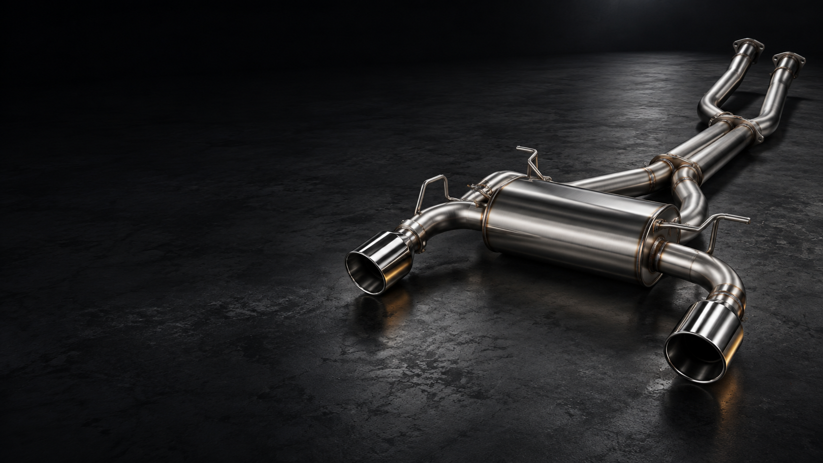 Stainless-steel exhaust system in a dark studio
